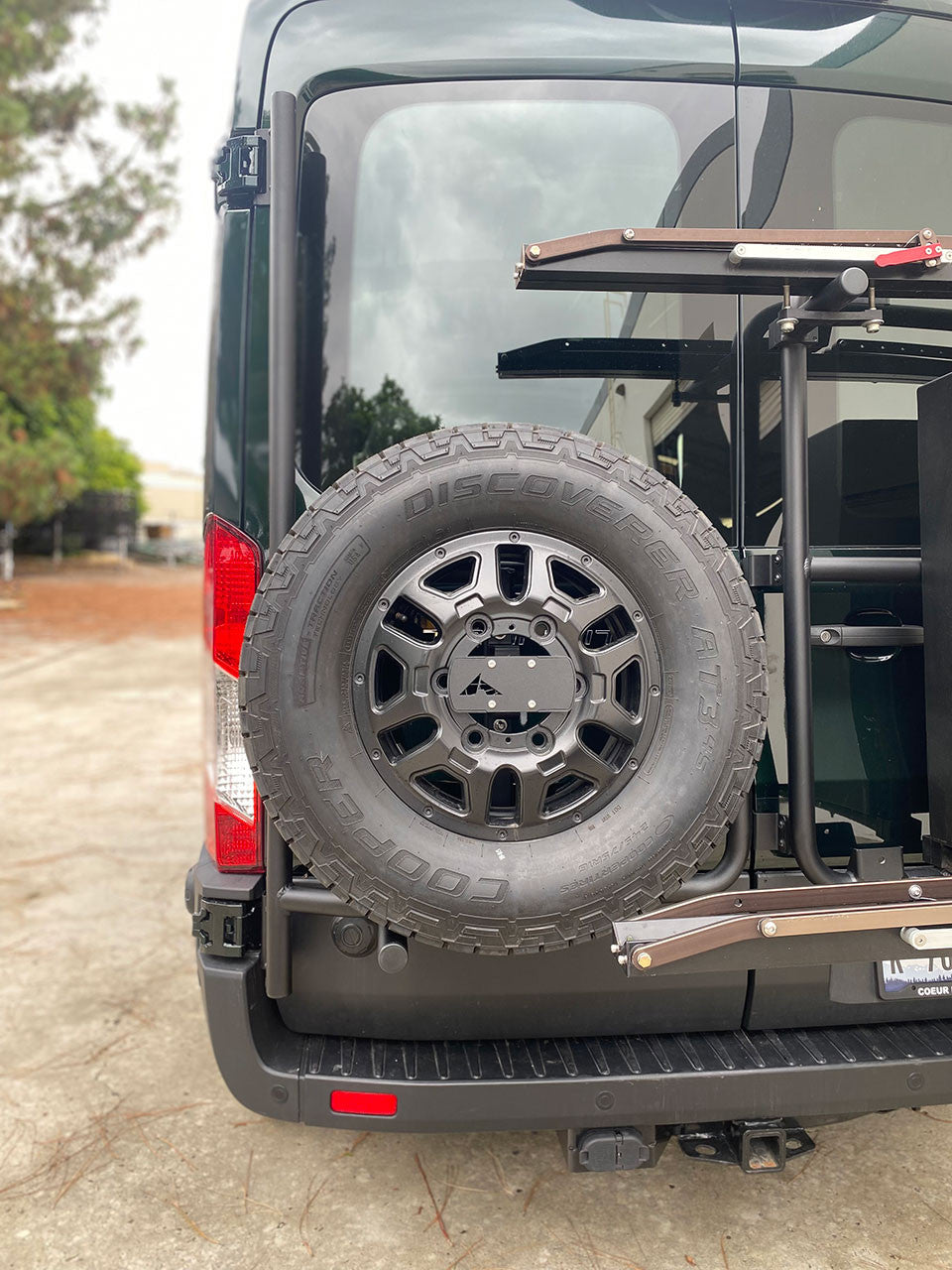 ALUMINESS - DRIVER SIDE REAR DOOR BOX/TIRE RACK (TRANSIT 2015+)